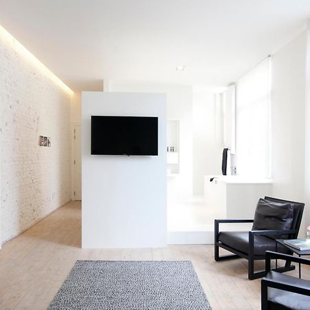 Maison Nationale City Flats & Suites Antverpy Pokoj fotografie A room at the hotel